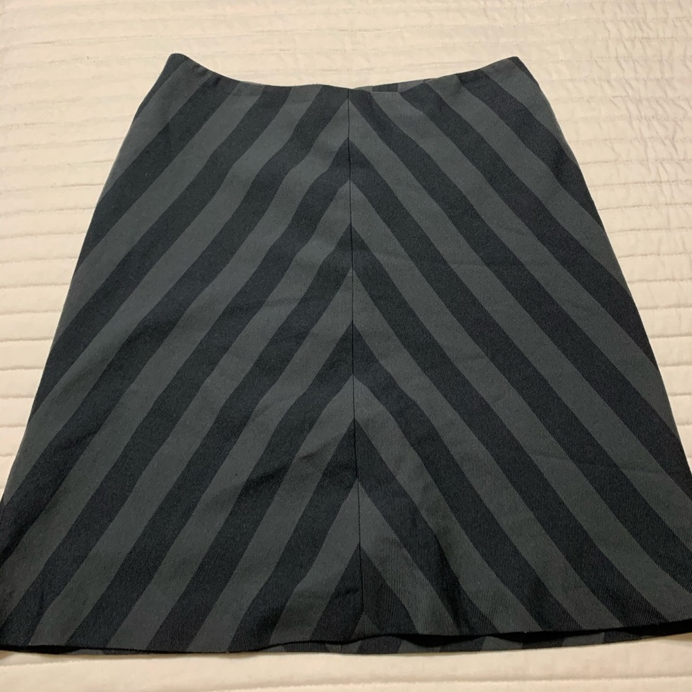 Black and gray skirt. A line.
